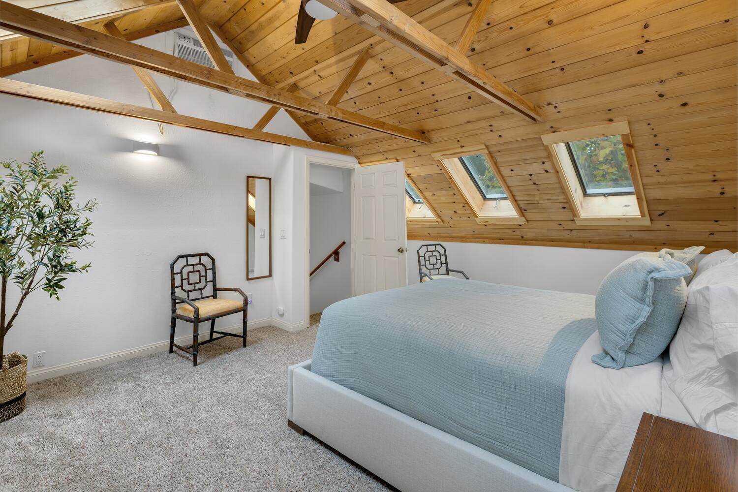 828 Foothill Lane Ojai, CA 93023 - Photo 29 of 40 a bedroom with a bed and a potted plant