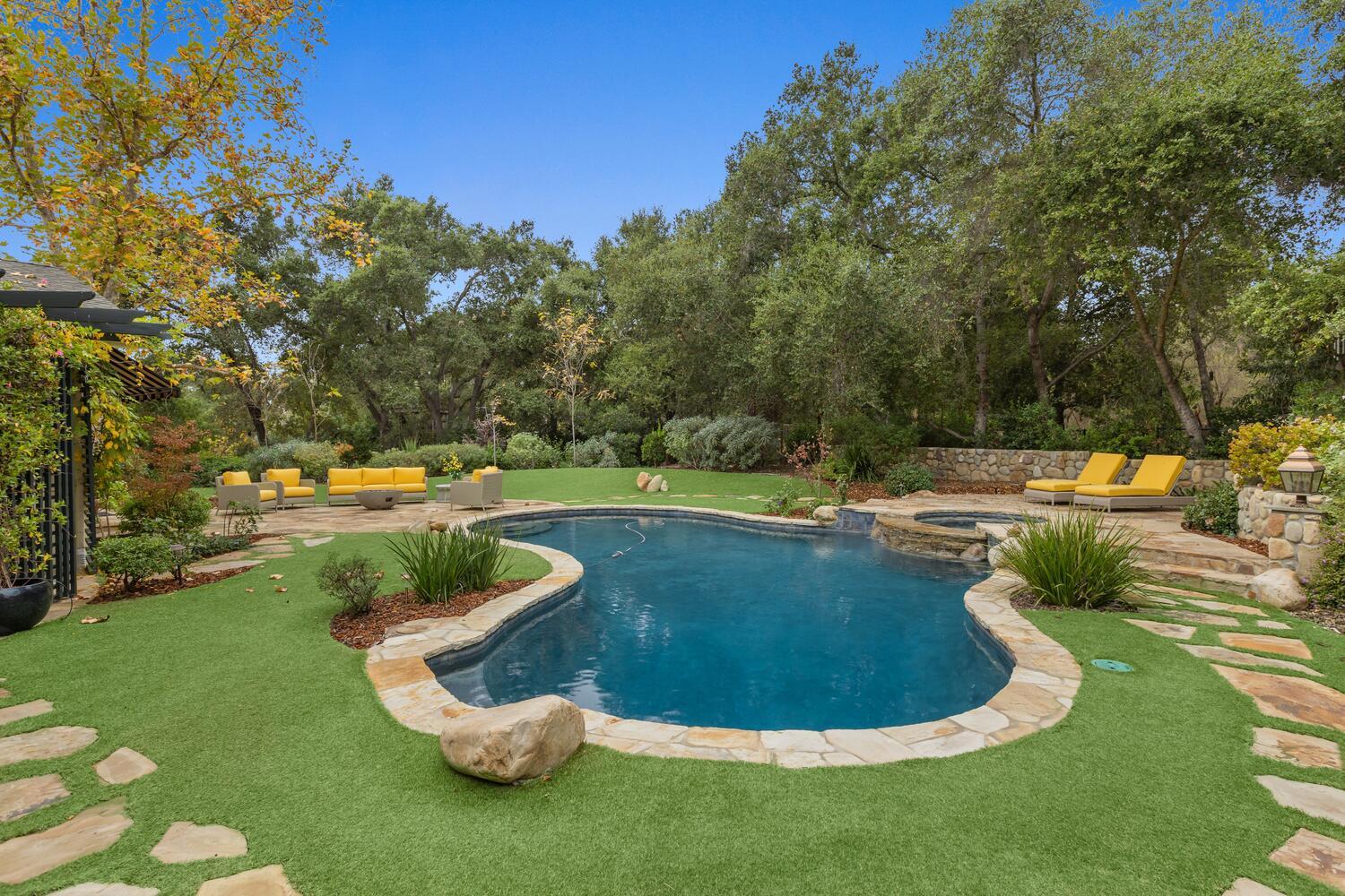 828 Foothill Lane Ojai, CA 93023 - Photo 31 of 40 a view of a swimming pool with a yard