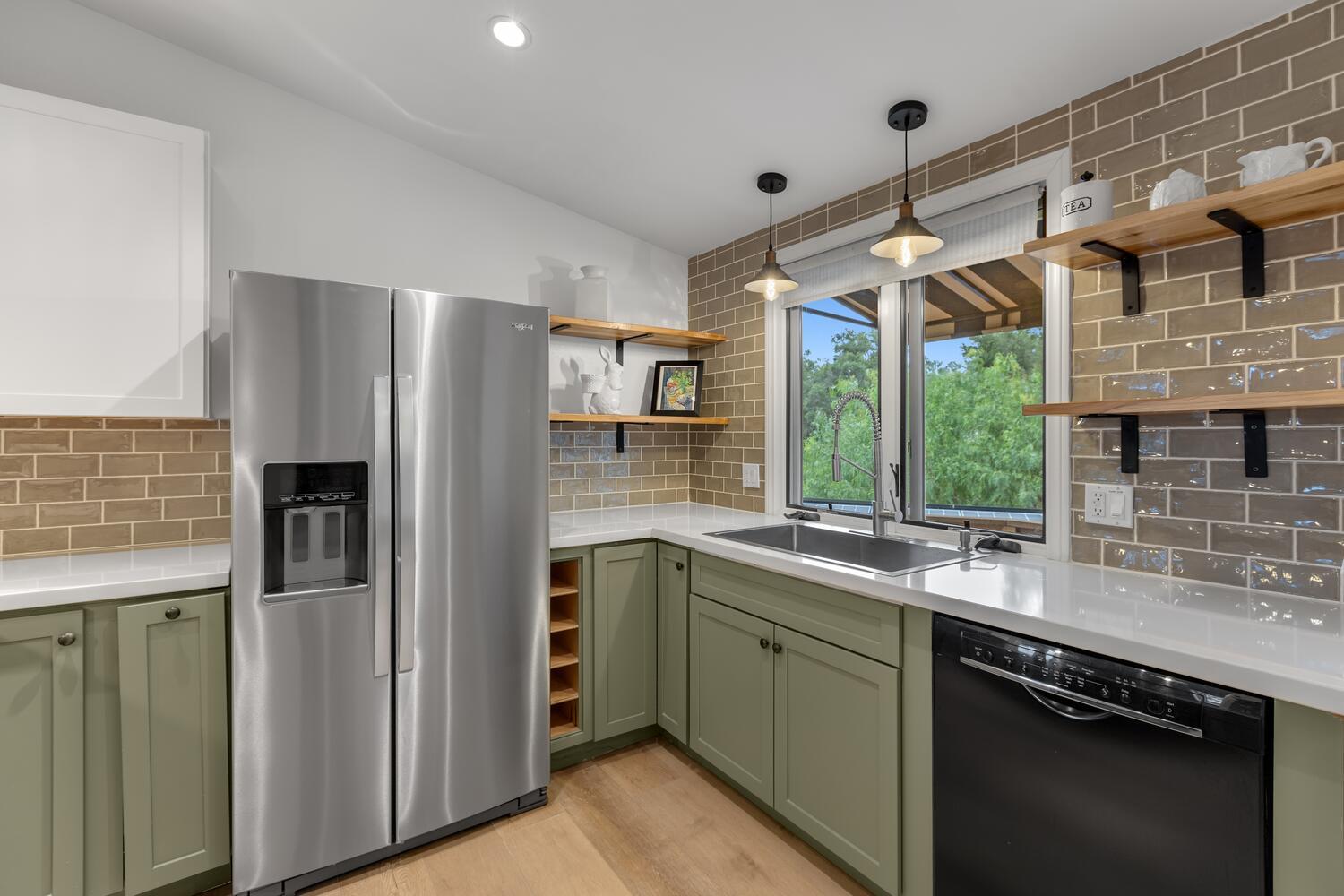 828 Foothill Lane Ojai, CA 93023 - Photo 35 of 40 a kitchen that has a sink a refrigerator and window