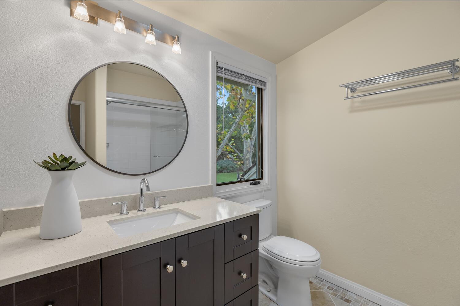 828 Foothill Lane Ojai, CA 93023 - Photo 37 of 40 a bathroom with a toilet sink and mirror