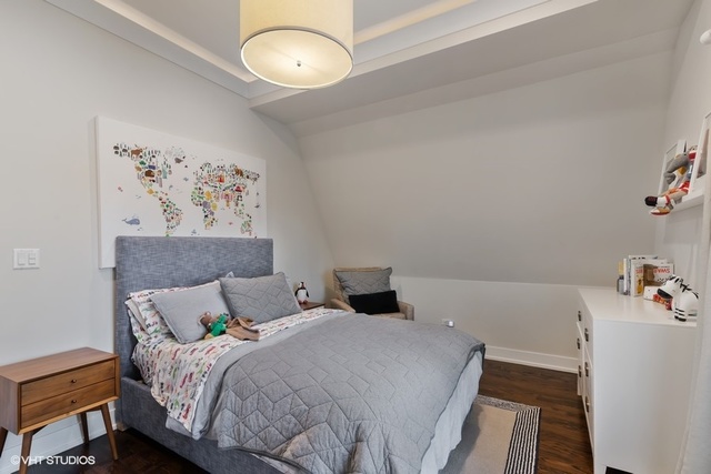 2708 West Nelson Street Chicago, IL 60618 - Photo 13 of 26 a bedroom with a bed and painting on the wall