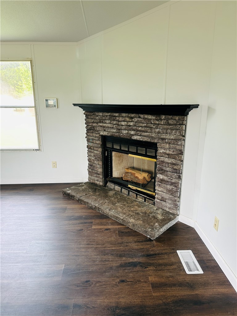 134 Arabian Way Anderson, SC 29626 - Photo 8 of 23 This inviting living space features a cozy fireplace, perfect for relaxation.