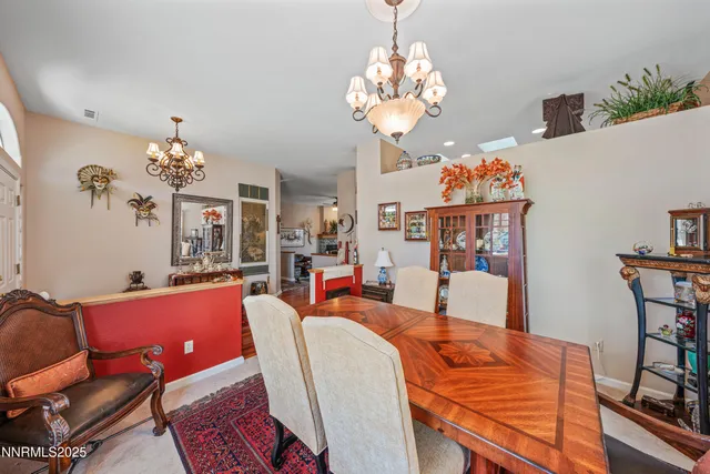 a living room with furniture a rug and a window