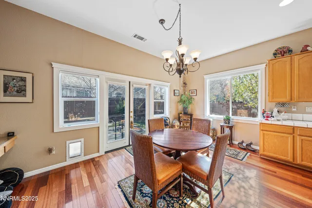 a kitchen with stainless steel appliances granite countertop a stove and a refrigerator