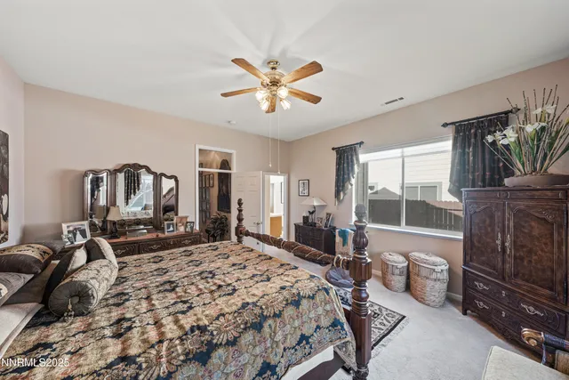 a view of a hallway with wooden floor and entryway