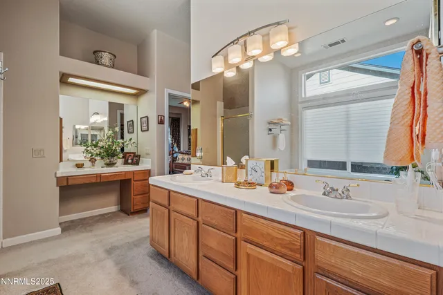 a living room with furniture cabinets and a book shelf