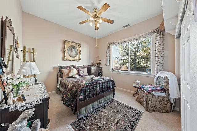 a view of a backyard with sitting area