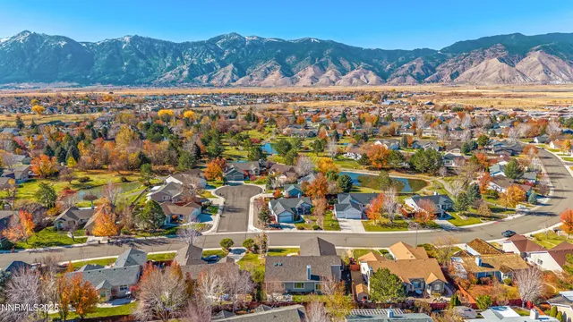 a living room with furniture chandelier and a chandelier