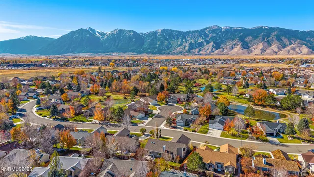 a living room with furniture or wooden floor and a chandelier