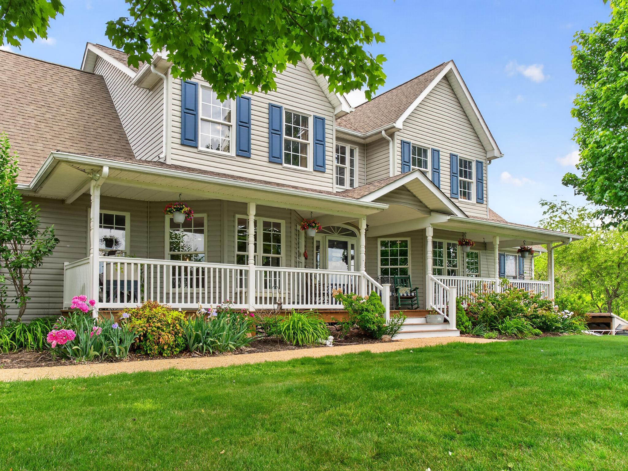front view of a house with a yard