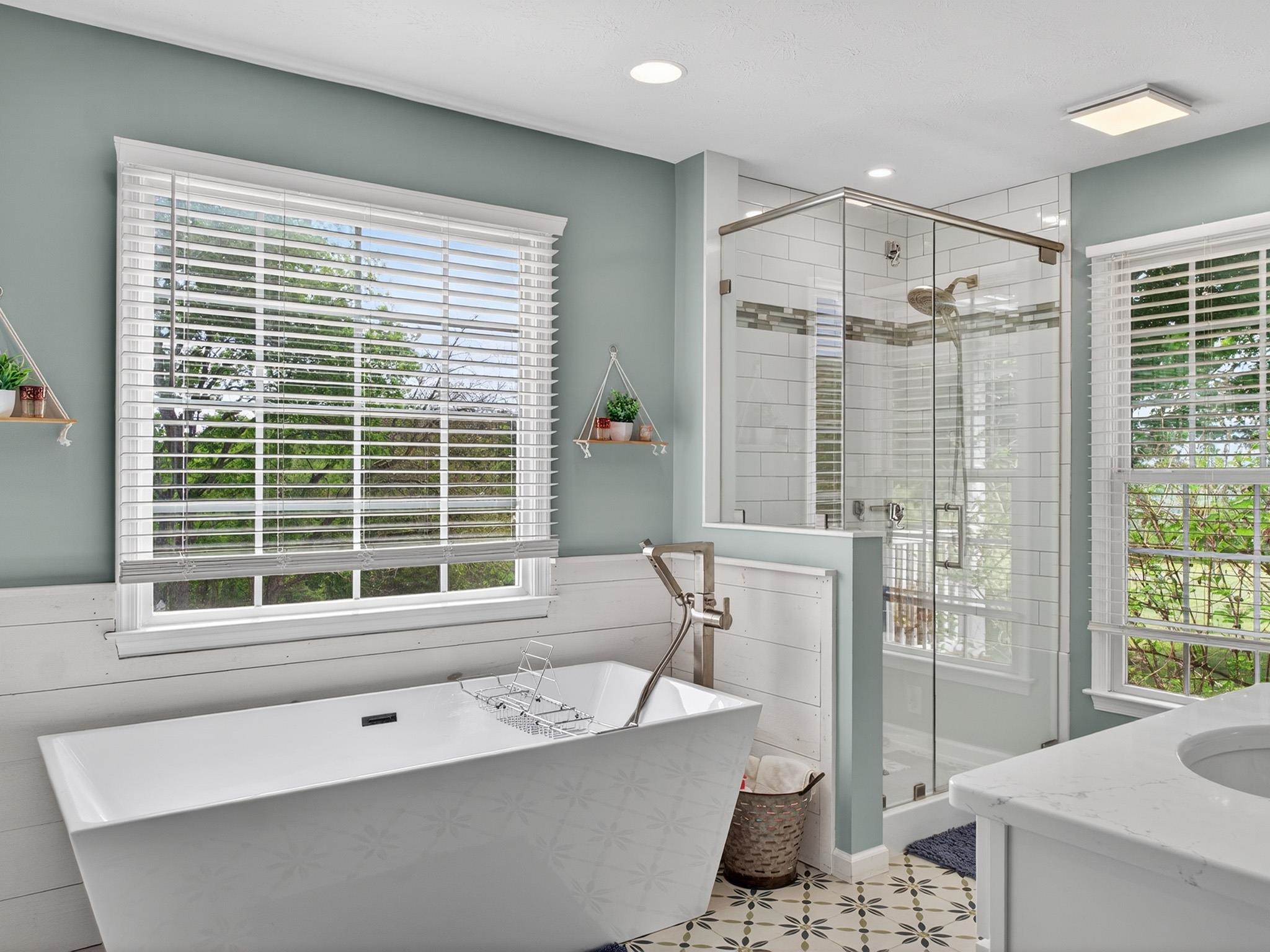 235 Howardsville Road Staunton, VA 24401 - Photo 17 of 48 a spacious bathroom with a granite countertop tub and a sink