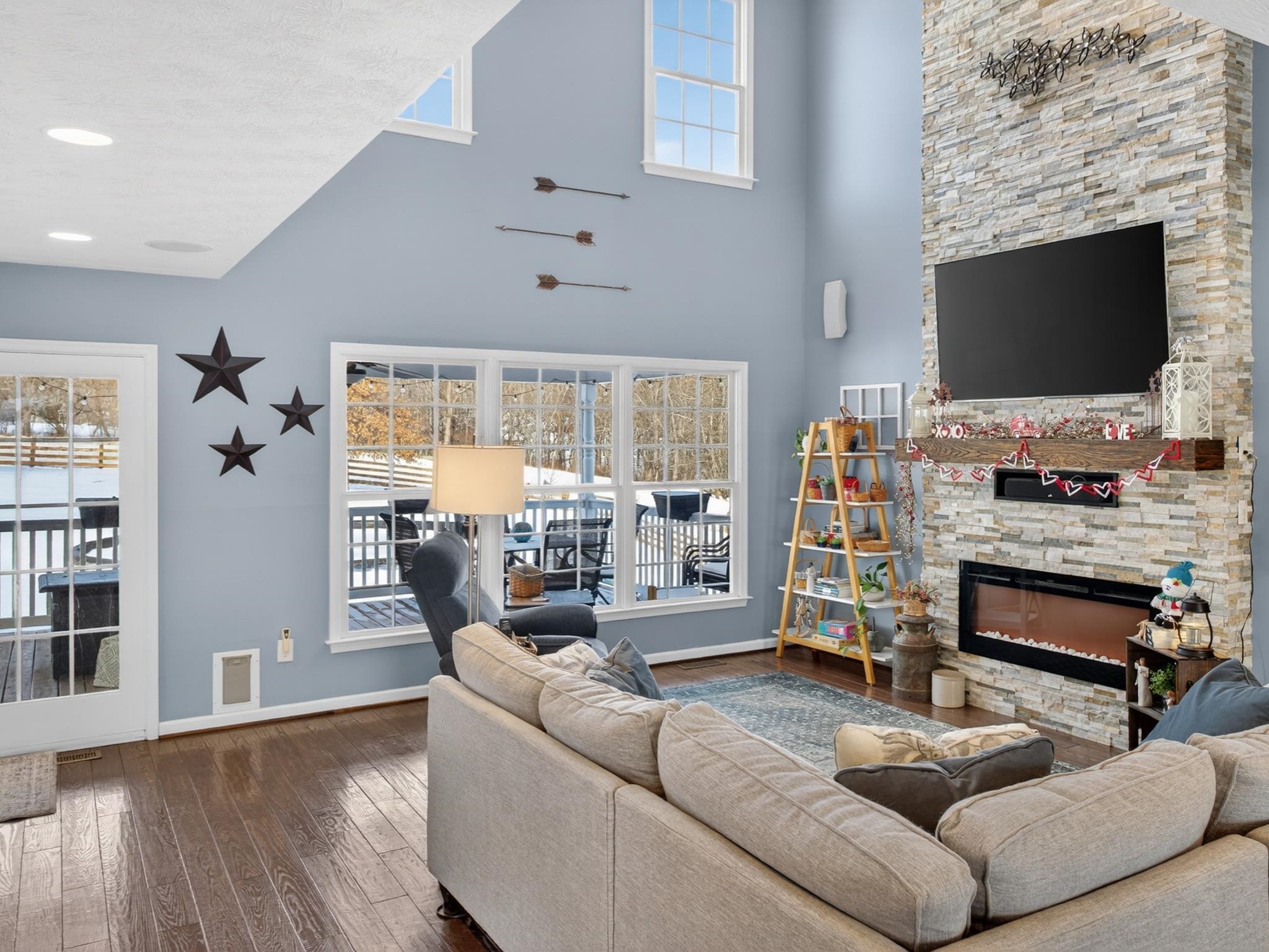 235 Howardsville Road Staunton, VA 24401 - Photo 18 of 51 a living room with fireplace furniture and a flat screen tv
