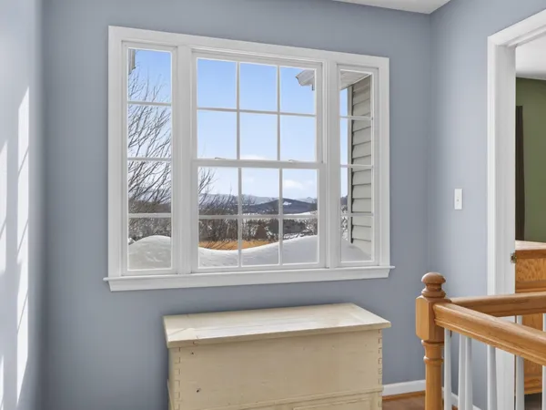 a bathroom with a sink and a window