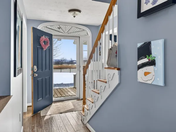 a view of front door and bedroom