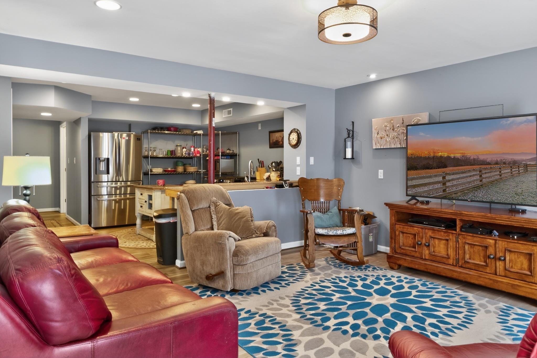 235 Howardsville Road Staunton, VA 24401 - Photo 36 of 51 a living room with furniture and a flat screen tv