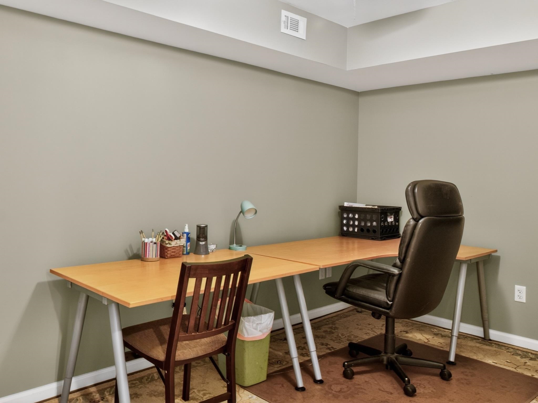 235 Howardsville Road Staunton, VA 24401 - Photo 40 of 51 a view of a workspace with furniture and a chair