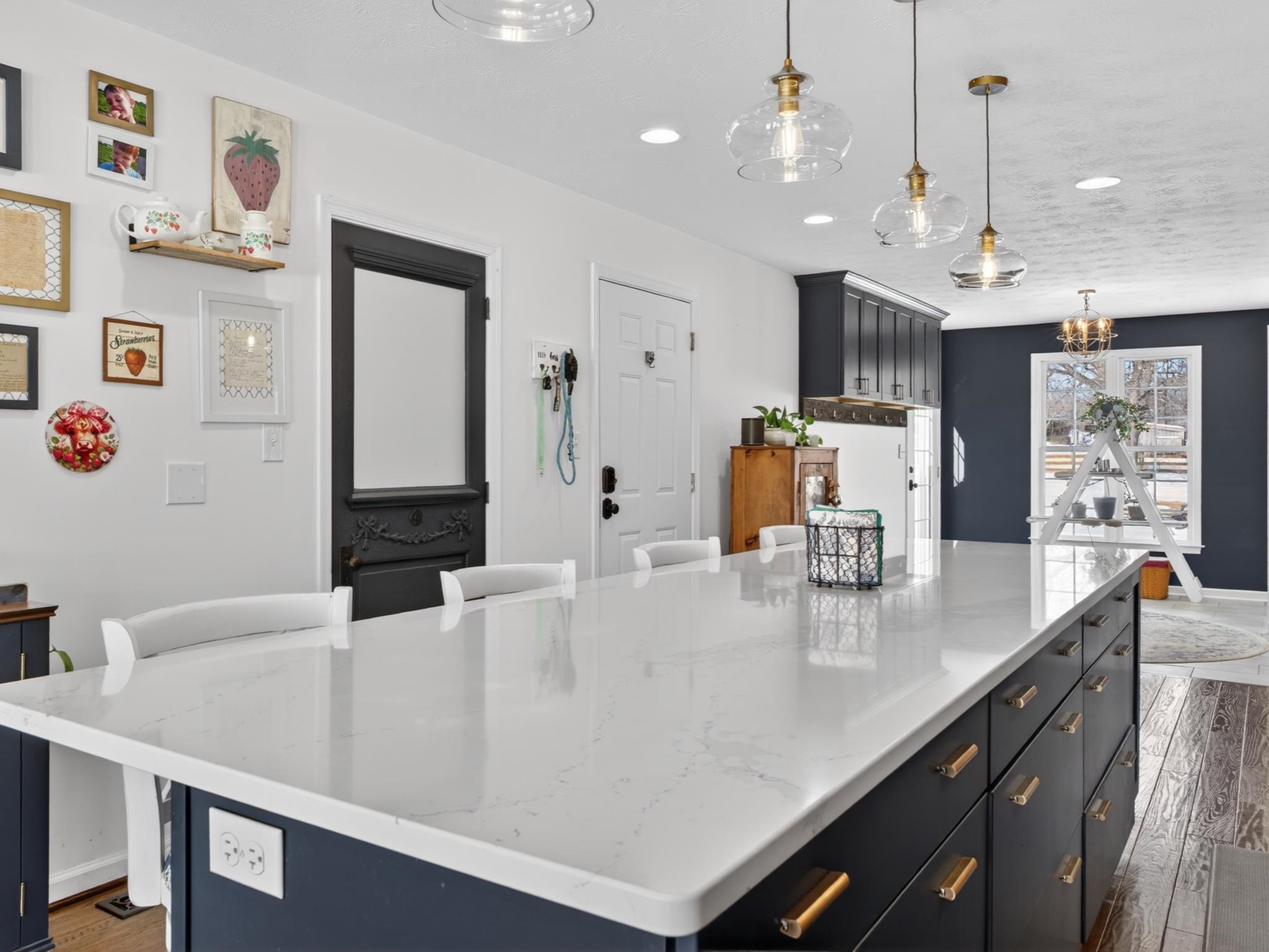 235 Howardsville Road Staunton, VA 24401 - Photo 7 of 51 a view of a kitchen with kitchen island a sink and living room view