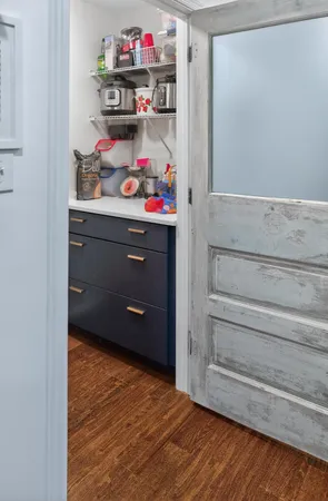 a room with storage and utility