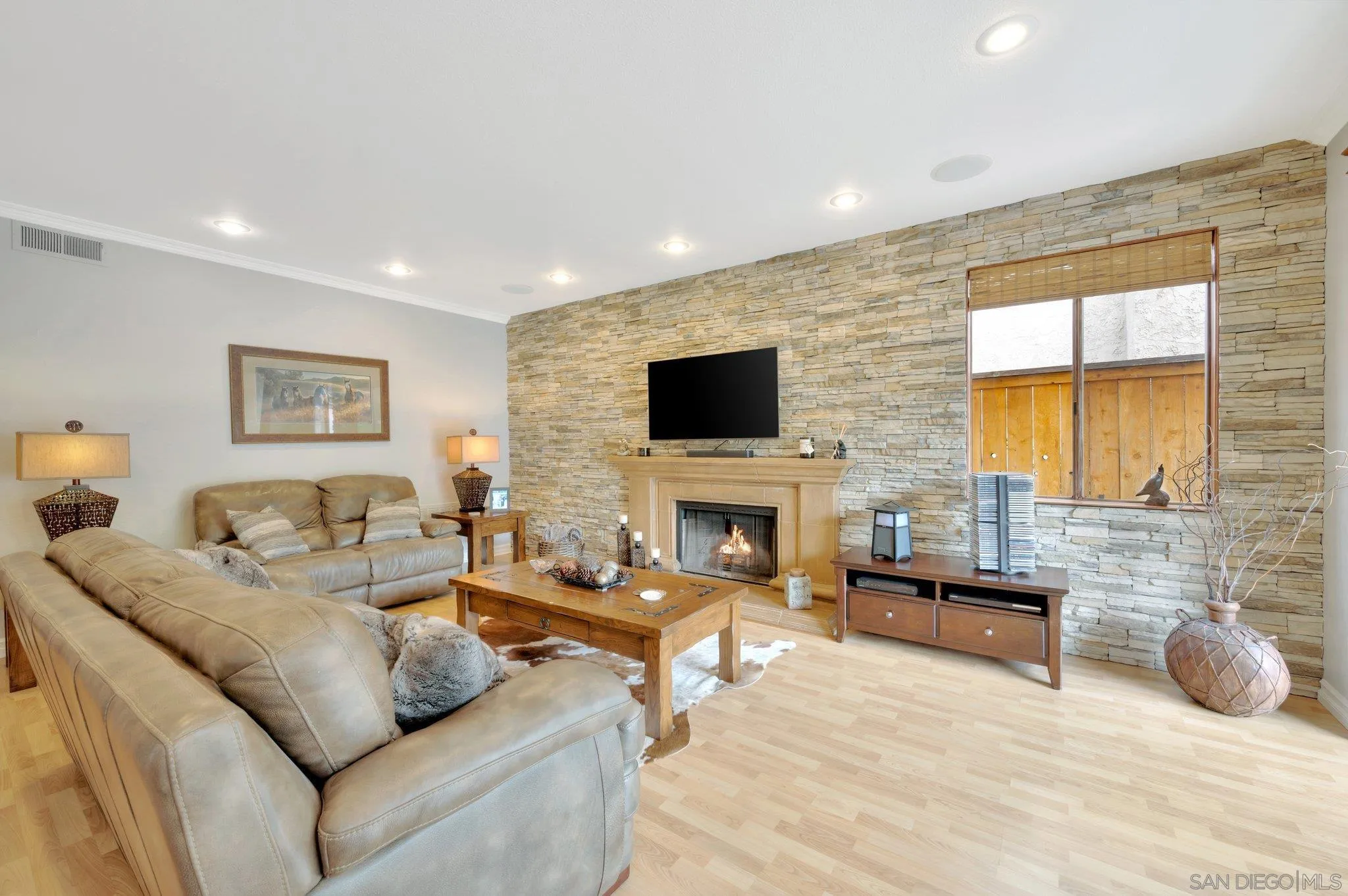 15095 Garden Road Poway, CA 92064 - Photo 16 of 55 a living room with furniture and a flat screen tv