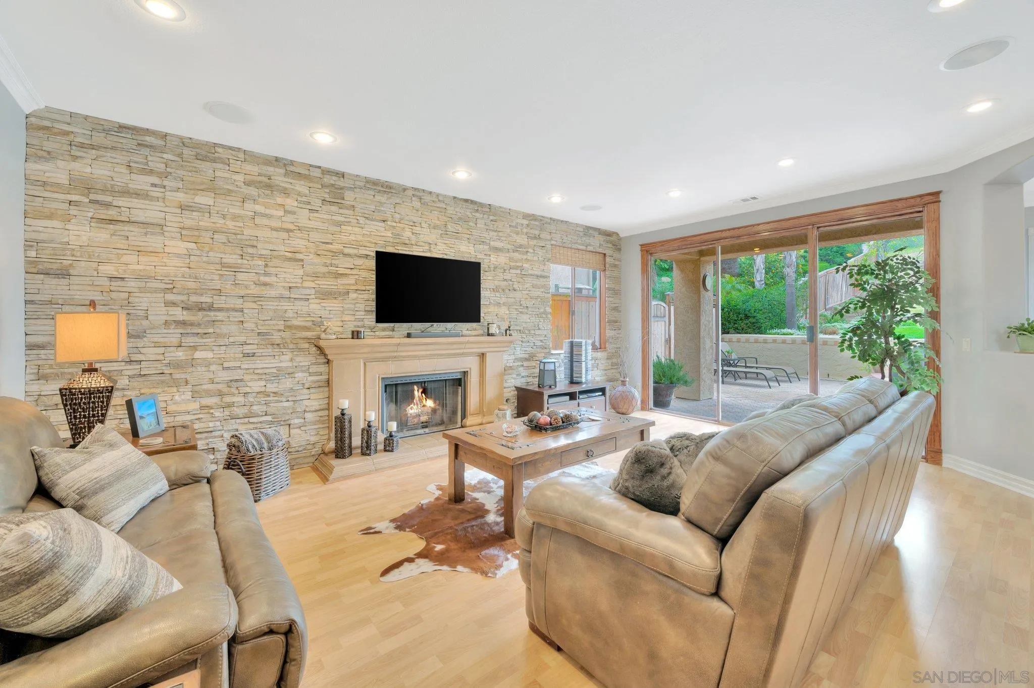 15095 Garden Road Poway, CA 92064 - Photo 17 of 55 a living room with furniture and a flat screen tv