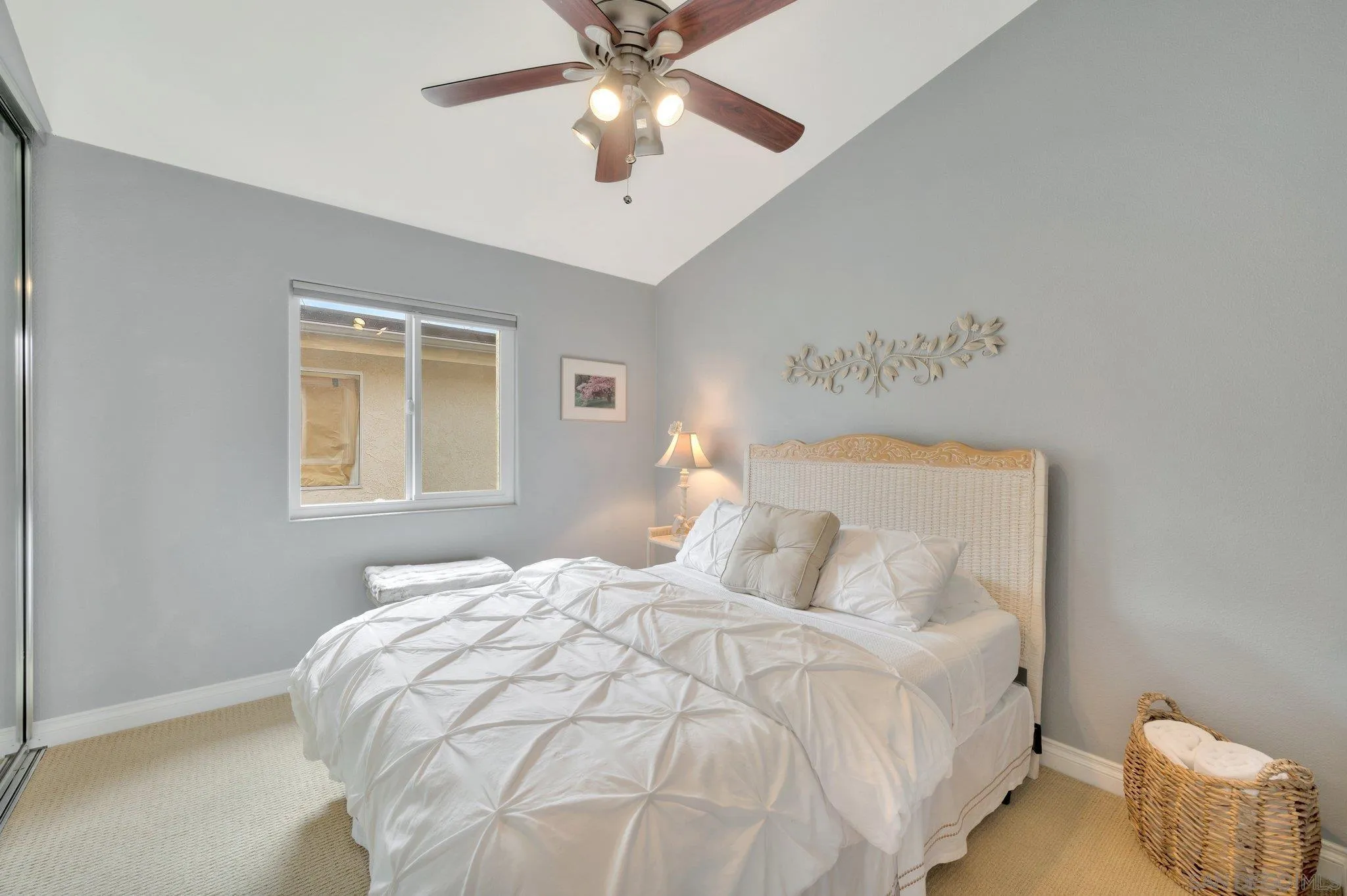 15095 Garden Road Poway, CA 92064 - Photo 26 of 55 a bedroom with a bed and a chandelier