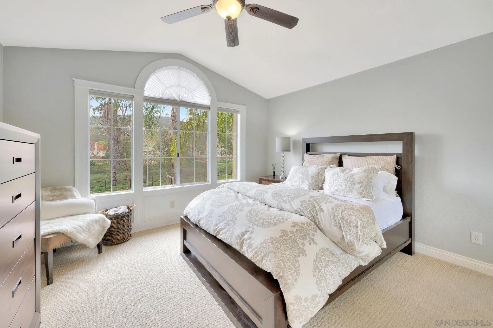 15095 Garden Road Poway, CA 92064 - Photo 29 of 55 a spacious bedroom with a bed and a large window