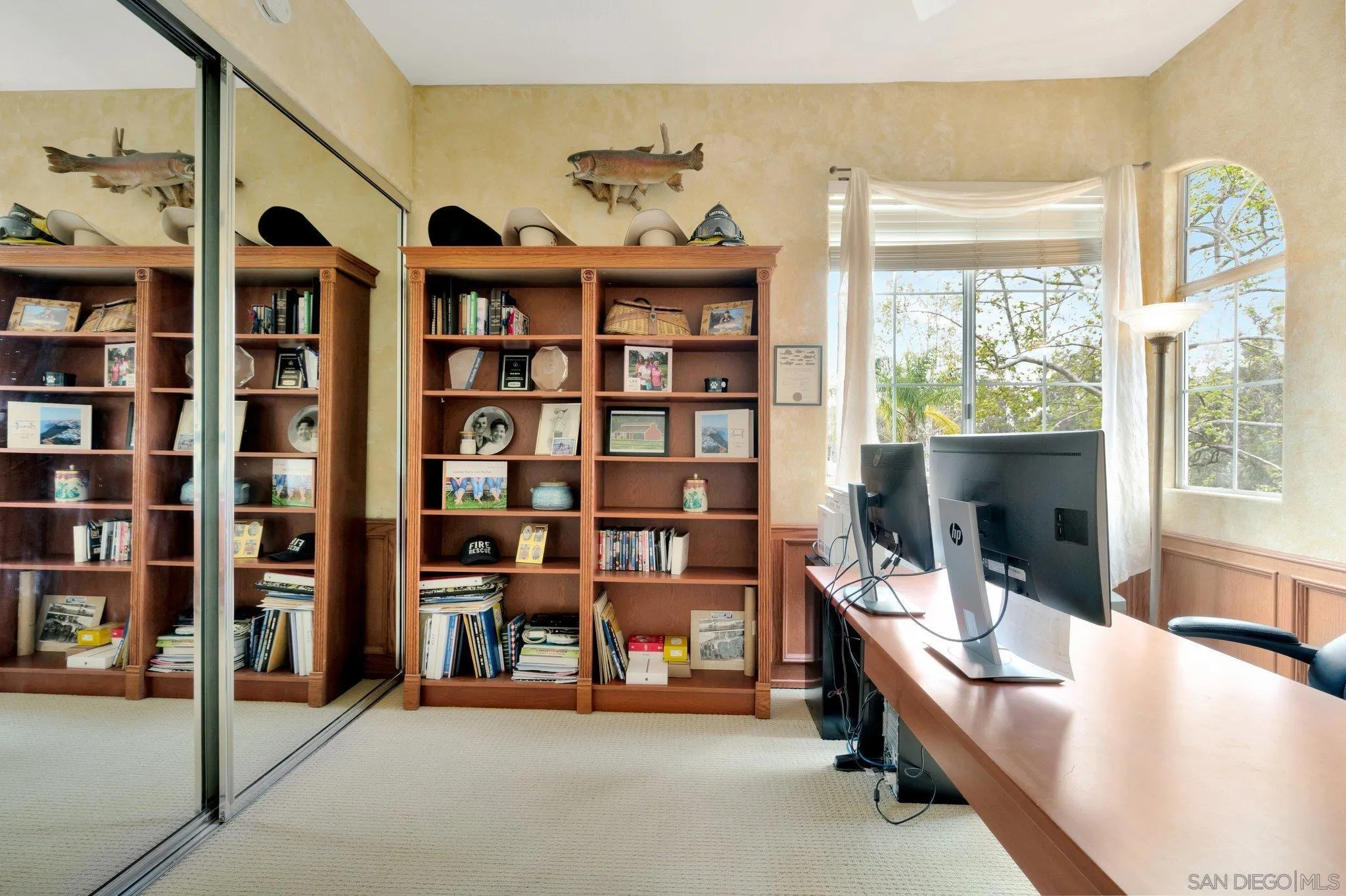 15095 Garden Road Poway, CA 92064 - Photo 33 of 55 a reading room with furniture and a book shelf