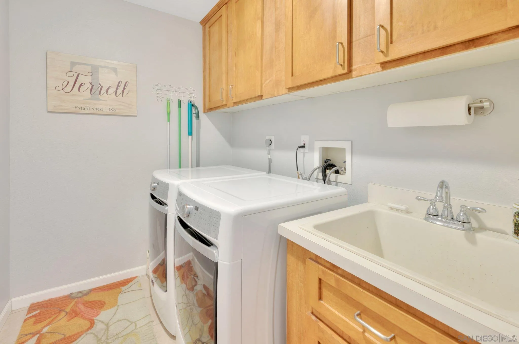 15095 Garden Road Poway, CA 92064 - Photo 34 of 55 a bathroom with a sink and a mirror