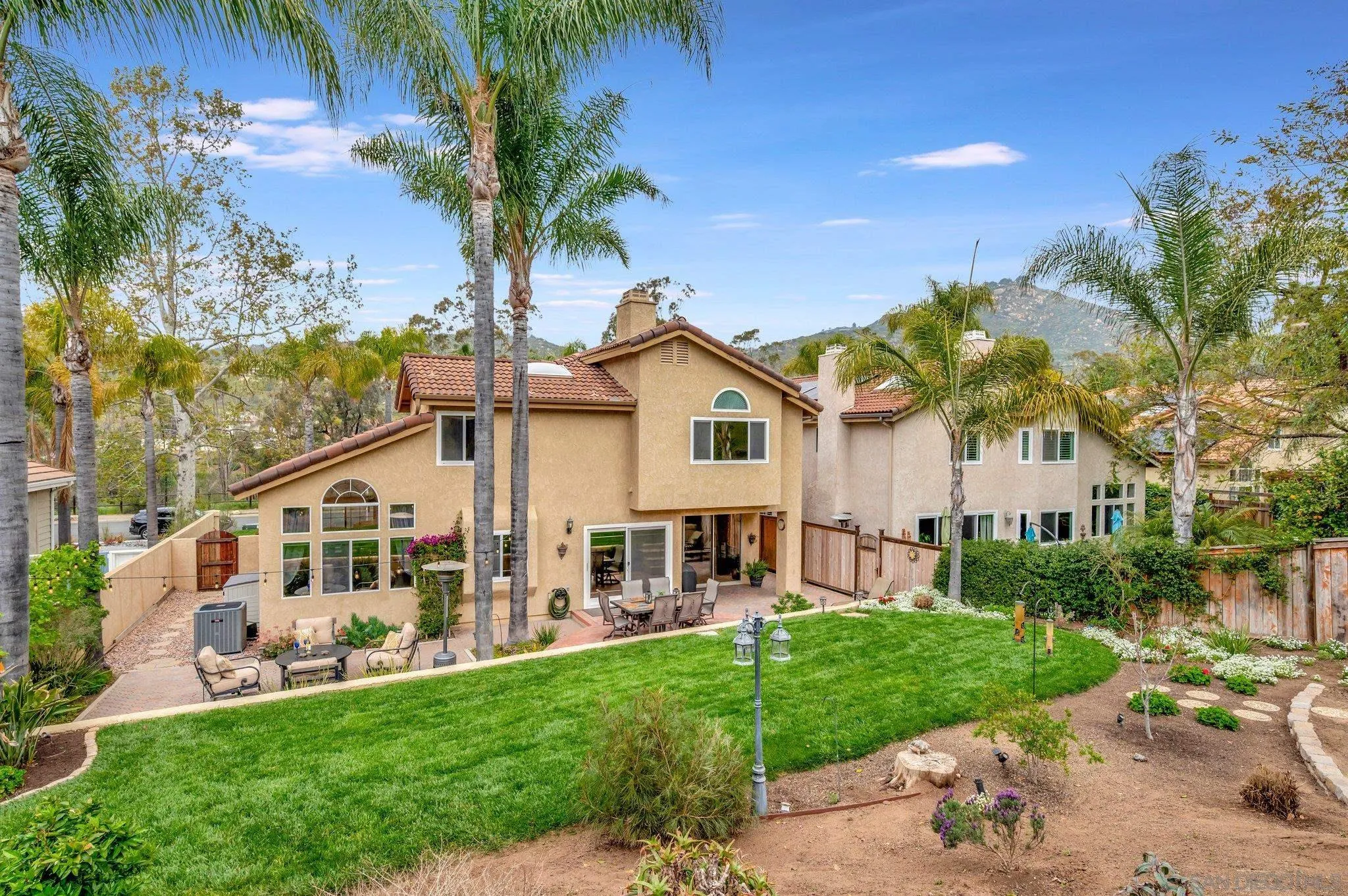 15095 Garden Road Poway, CA 92064 - Photo 41 of 55 a view of a house with a yard