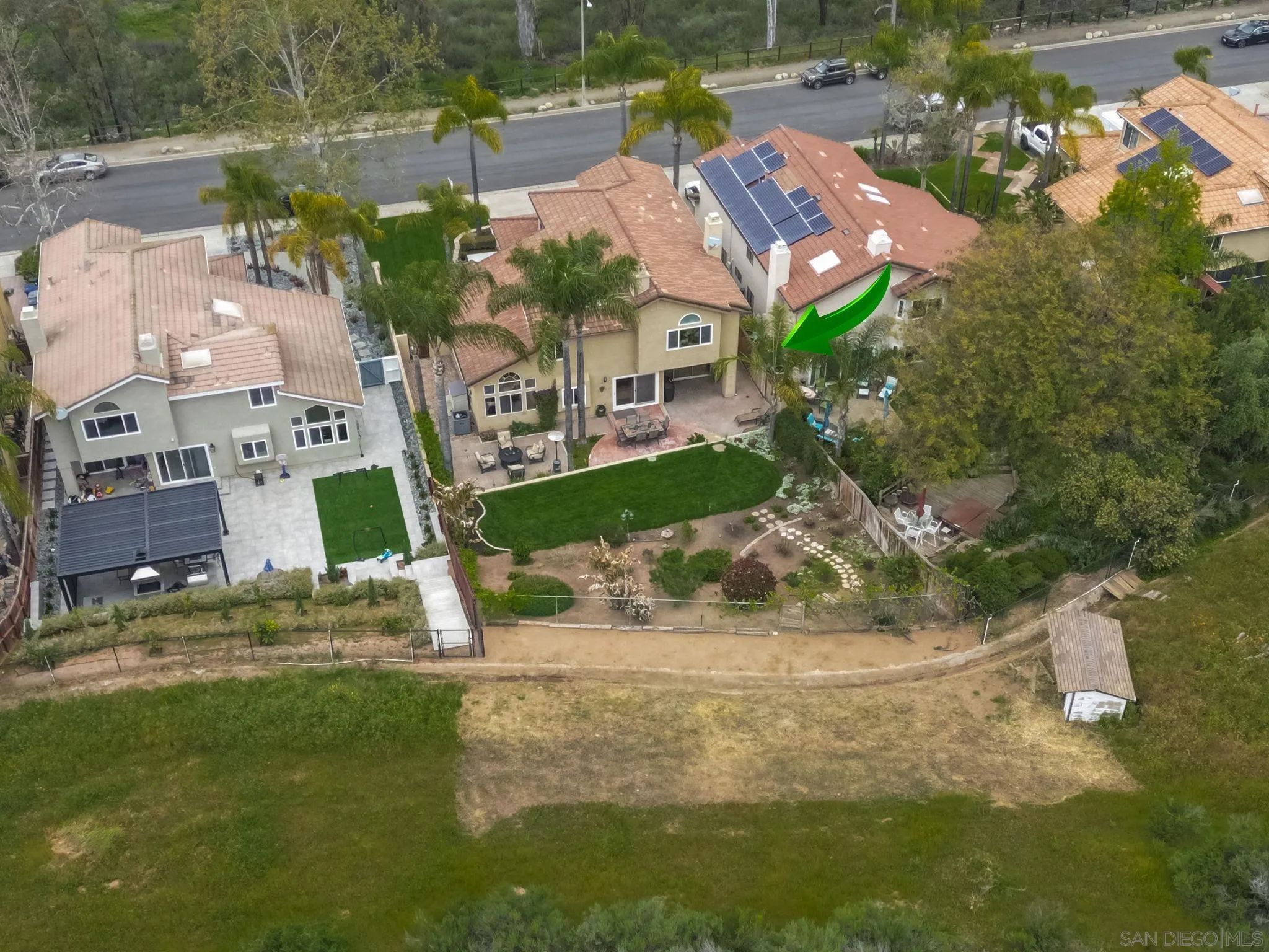 15095 Garden Road Poway, CA 92064 - Photo 48 of 55 an aerial view of residential houses with outdoor space and street view