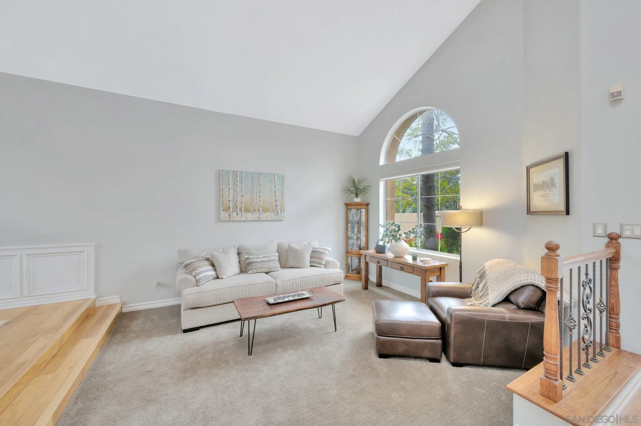 15095 Garden Road Poway, CA 92064 - Photo 7 of 55 a living room with furniture and a large window