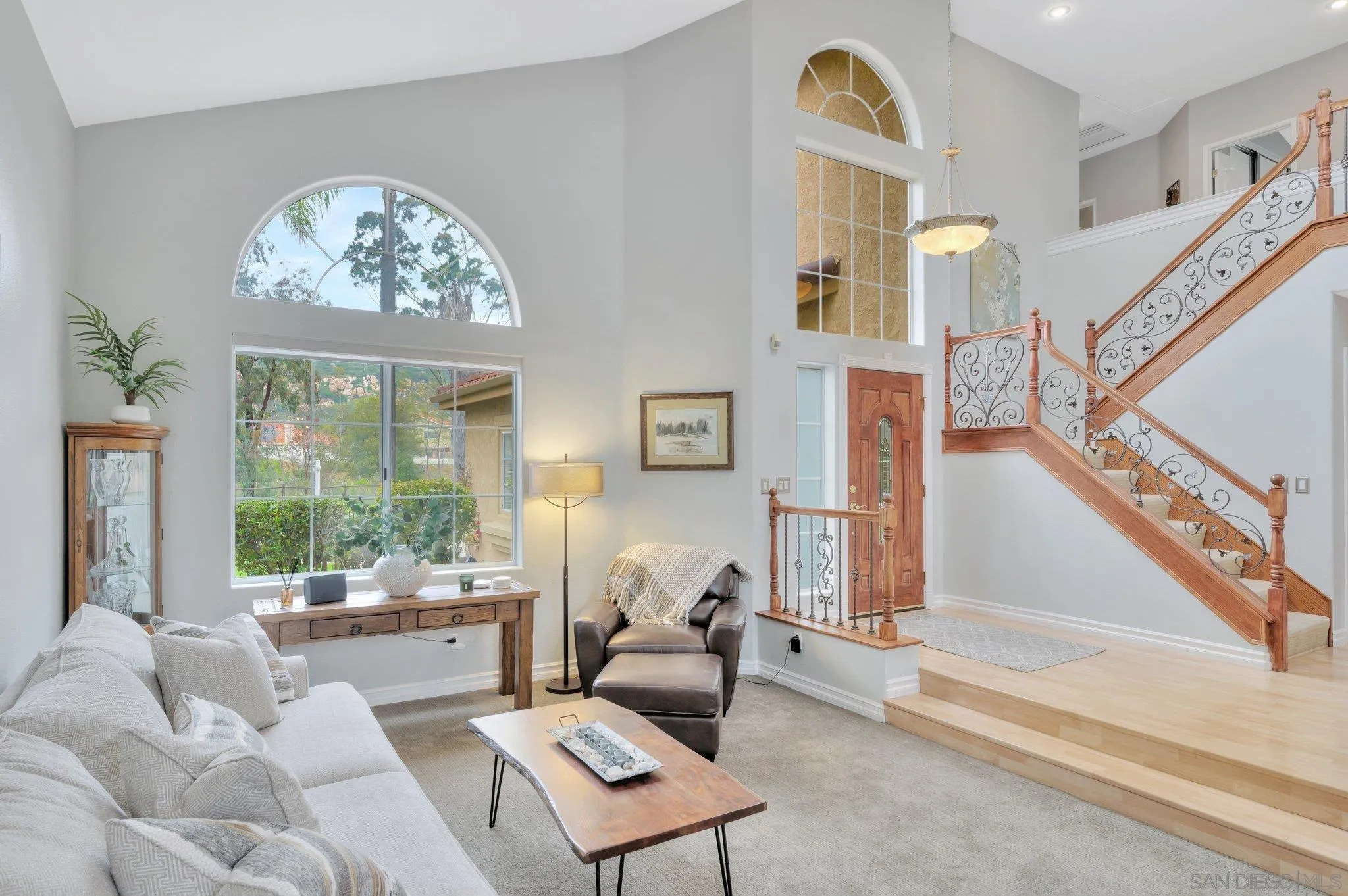 15095 Garden Road Poway, CA 92064 - Photo 8 of 55 a living room with furniture and a large window