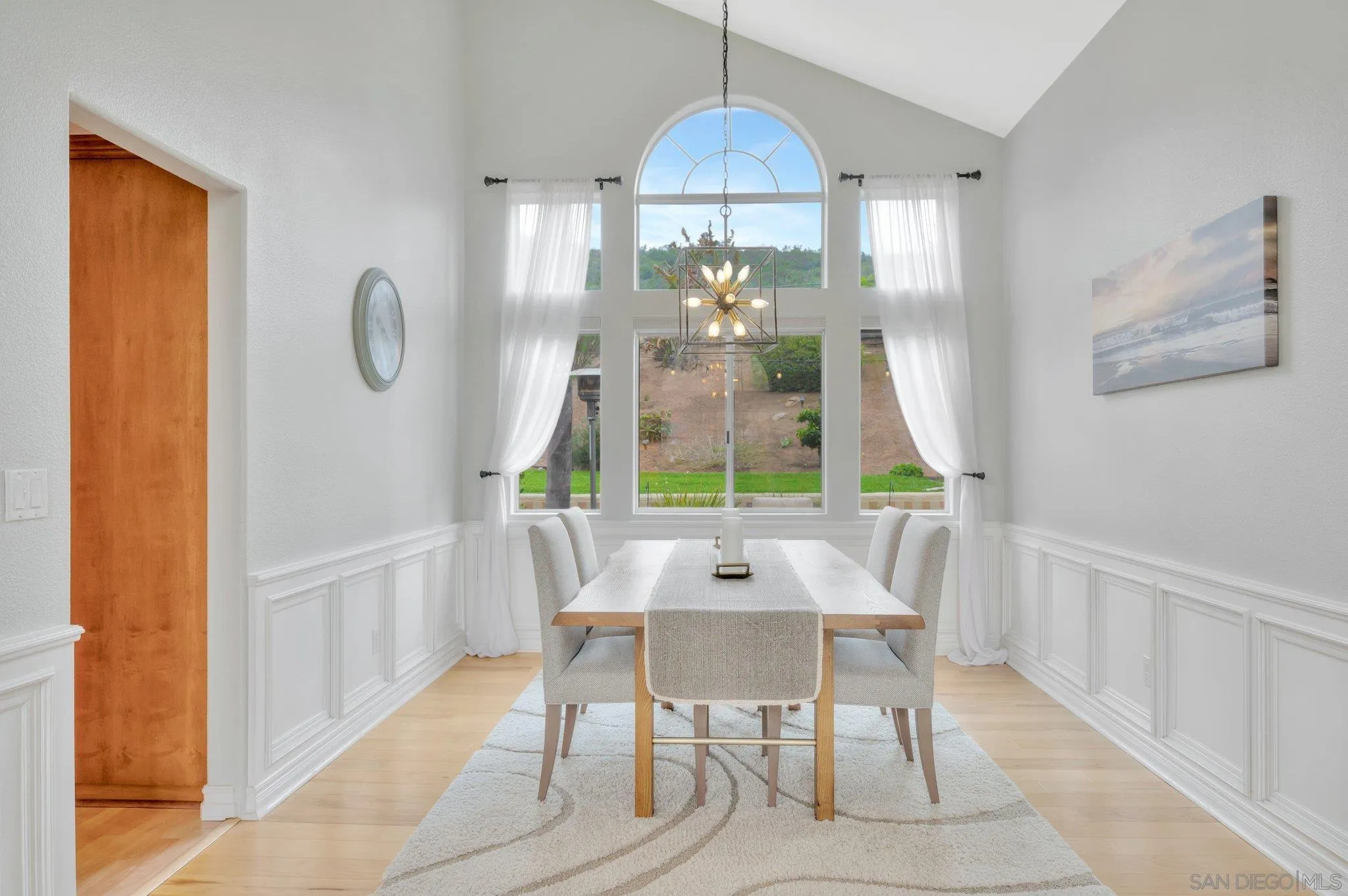 15095 Garden Road Poway, CA 92064 - Photo 9 of 55 a view of a dining room with furniture window and wooden floor