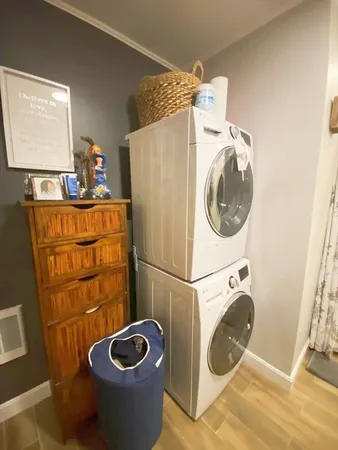 a utility room with dryer and washer