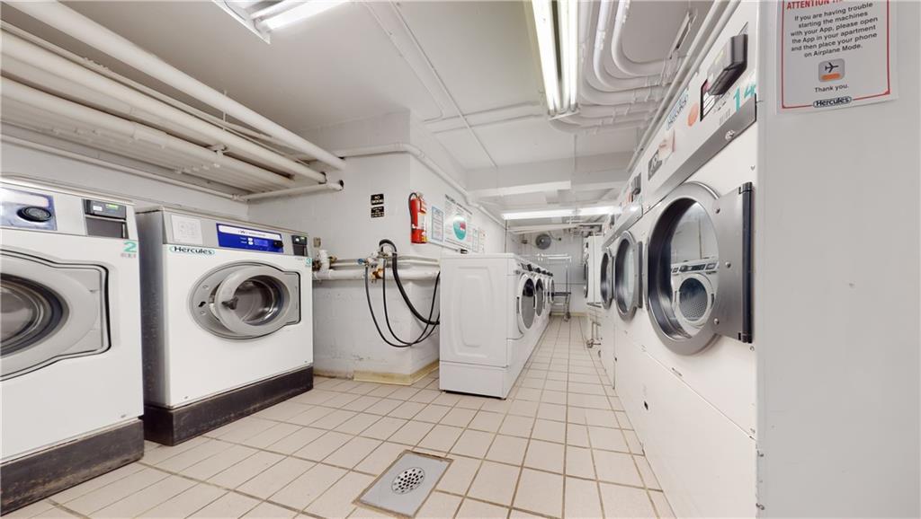 191 73rd Street, Unit 296 Brooklyn, NY 11209 - Photo 14 of 20 a utility room with dryer and washer