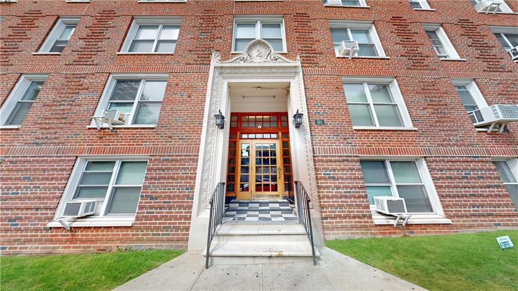 191 73rd Street, Unit 296 Brooklyn, NY 11209 - Photo 3 of 20 front view of a brick house