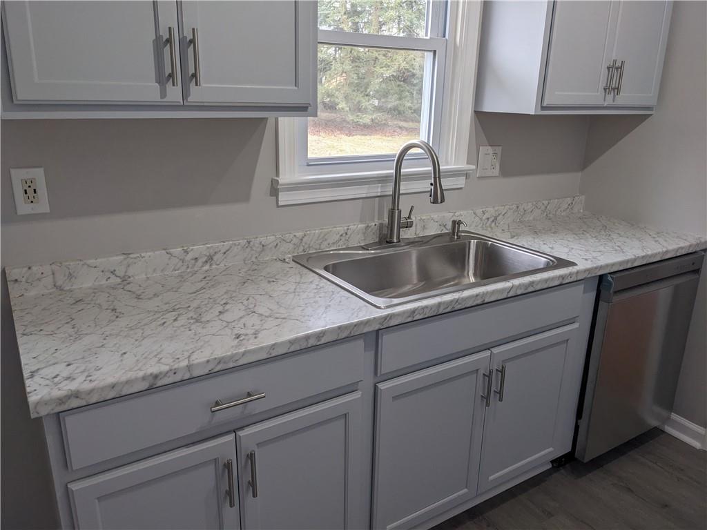 777 Blackhawk Road Beaver Falls, PA 15010 - Photo 5 of 20 New cabinets, counter tops, sink and dishwasher.