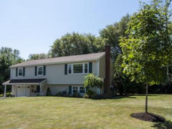 9 Stonybrook Road Medfield, MA 02052 - Photo 2 of 21 a front view of house with yard and trees