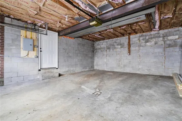 a view of a room with wooden walls