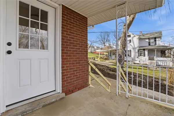 a view of a balcony with door
