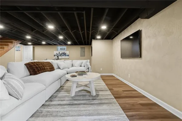 a living room with furniture and a table