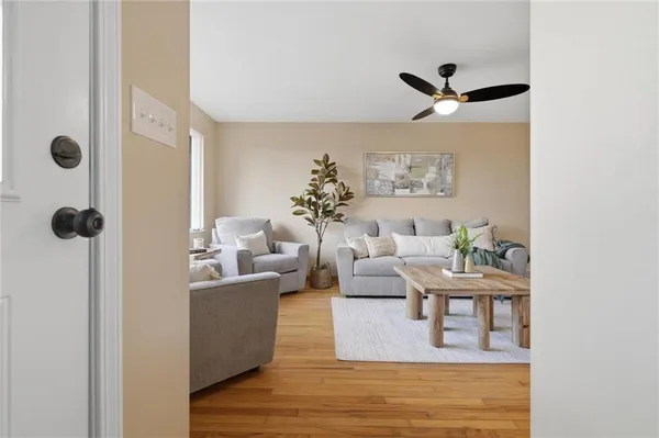 a living room with furniture and a window