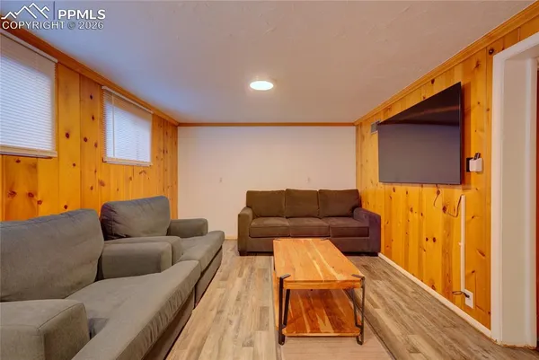 a living room with a couch and a table