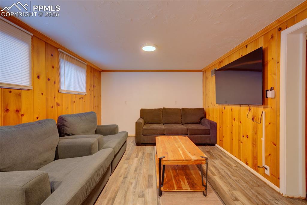 5835 Carnia Road Cascade, CO 80809 - Photo 24 of 31 a living room with a couch and a table