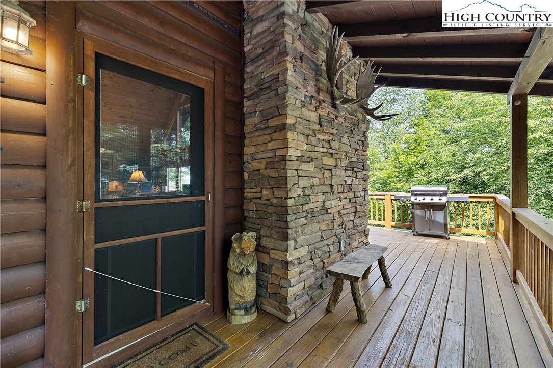 320 Timber Ridge Road Sugar Mountain, NC 28604 - Photo 11 of 30 a balcony with wooden floor