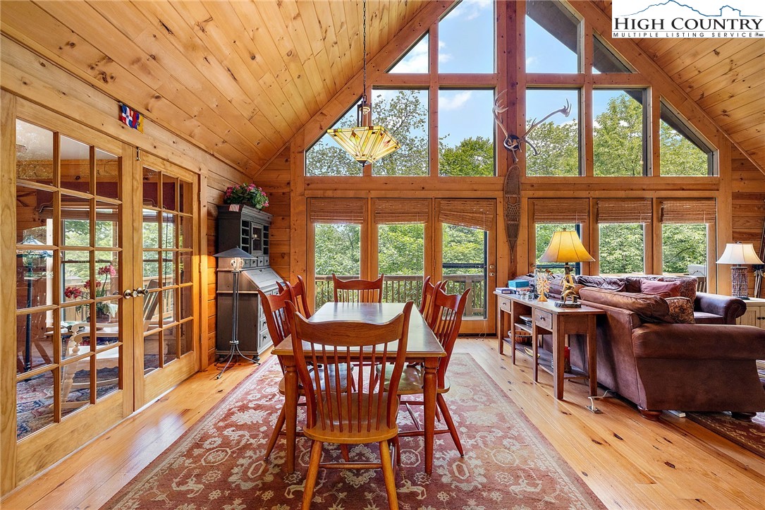 320 Timber Ridge Road Sugar Mountain, NC 28604 - Photo 16 of 30 a view of a dining room with furniture window and outside view