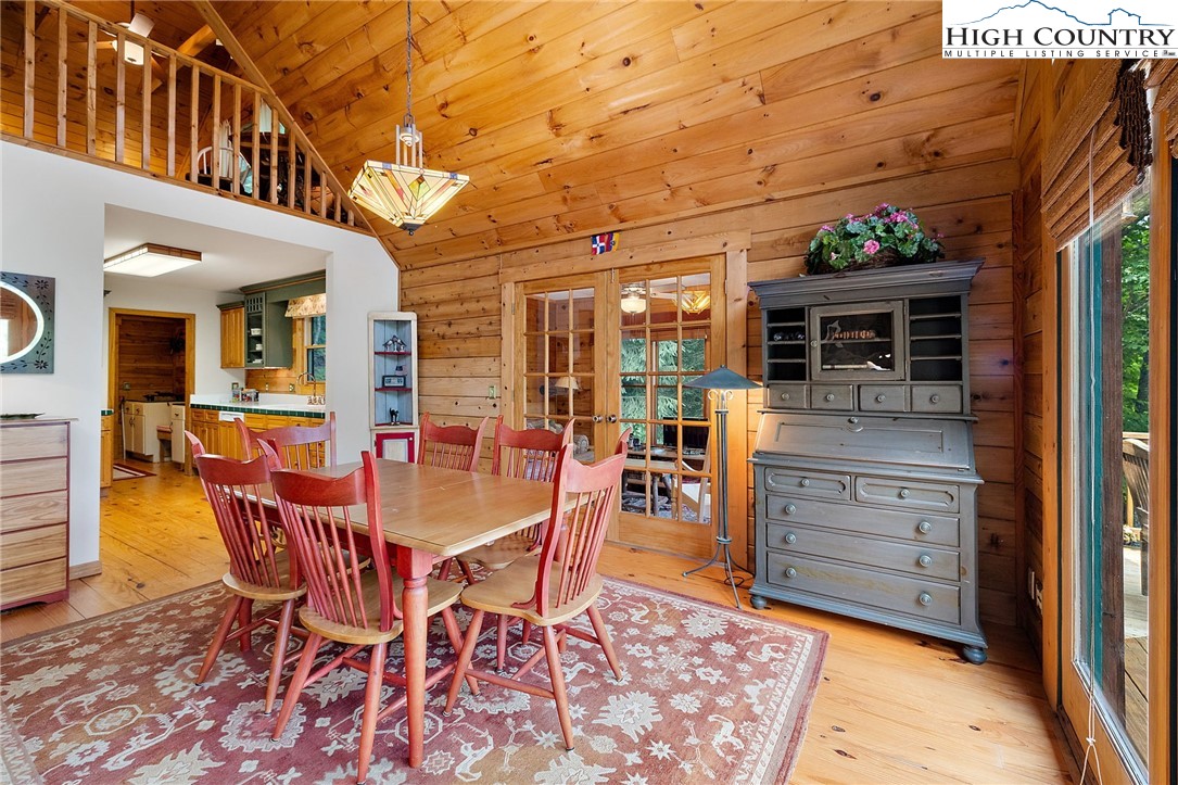 320 Timber Ridge Road Sugar Mountain, NC 28604 - Photo 17 of 30 a view of a dining room with furniture