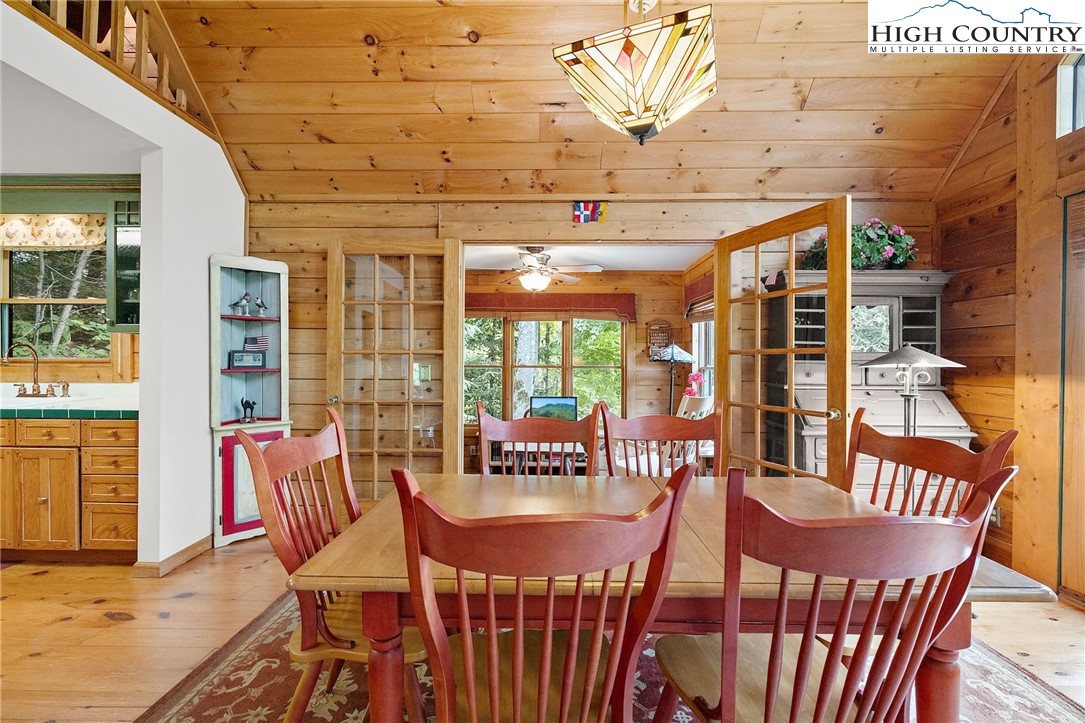 320 Timber Ridge Road Sugar Mountain, NC 28604 - Photo 29 of 30 a view of a dining room with furniture window and outside view