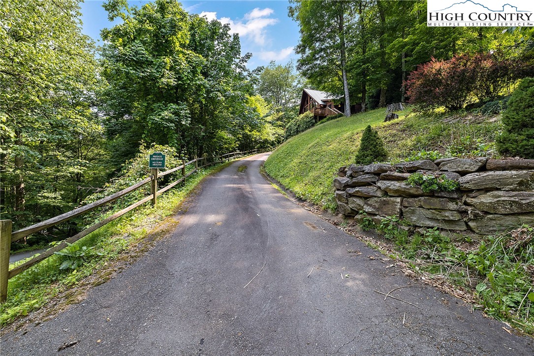 320 Timber Ridge Road Sugar Mountain, NC 28604 - Photo 8 of 30 a view of a pathway with a park