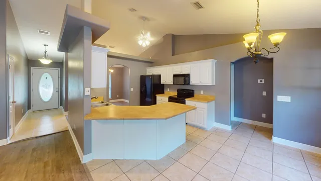 a view of a living room and dining room